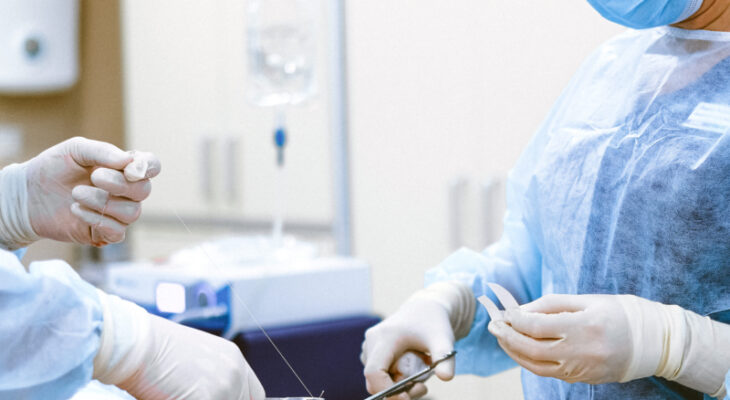 Photo of medical professionals wearing personal protective equipment