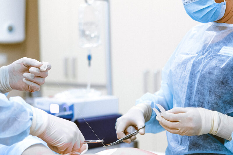 Photo of medical professionals wearing personal protective equipment